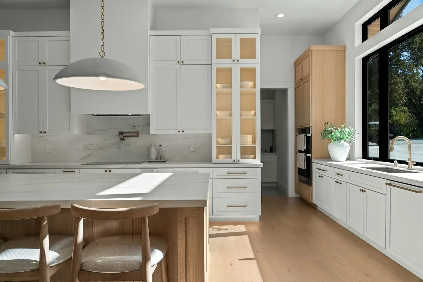 A bright residential kitchen with cabinets and counters. Wheaton.