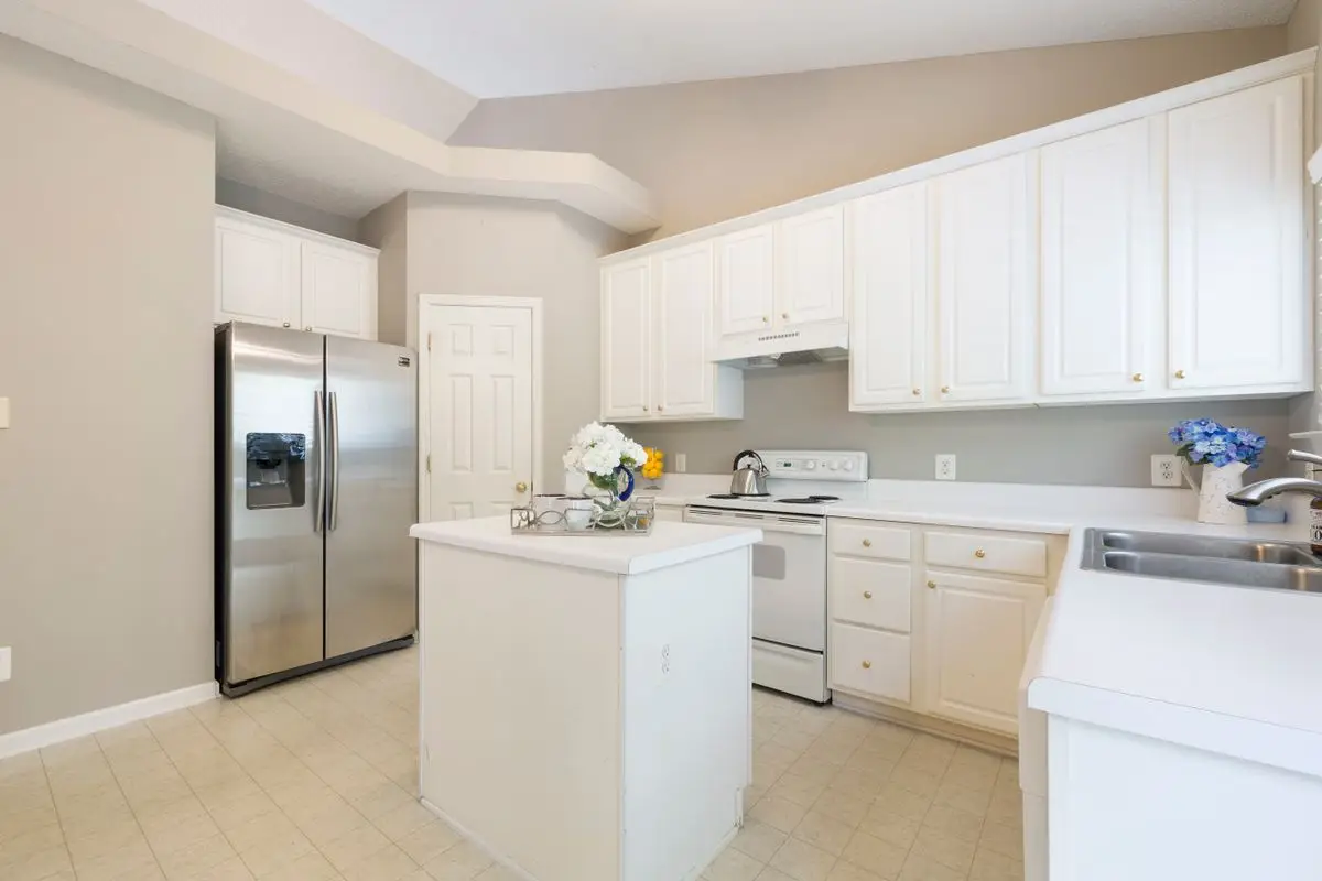 A bright residential kitchen with cabinets and counters. Wheaton.