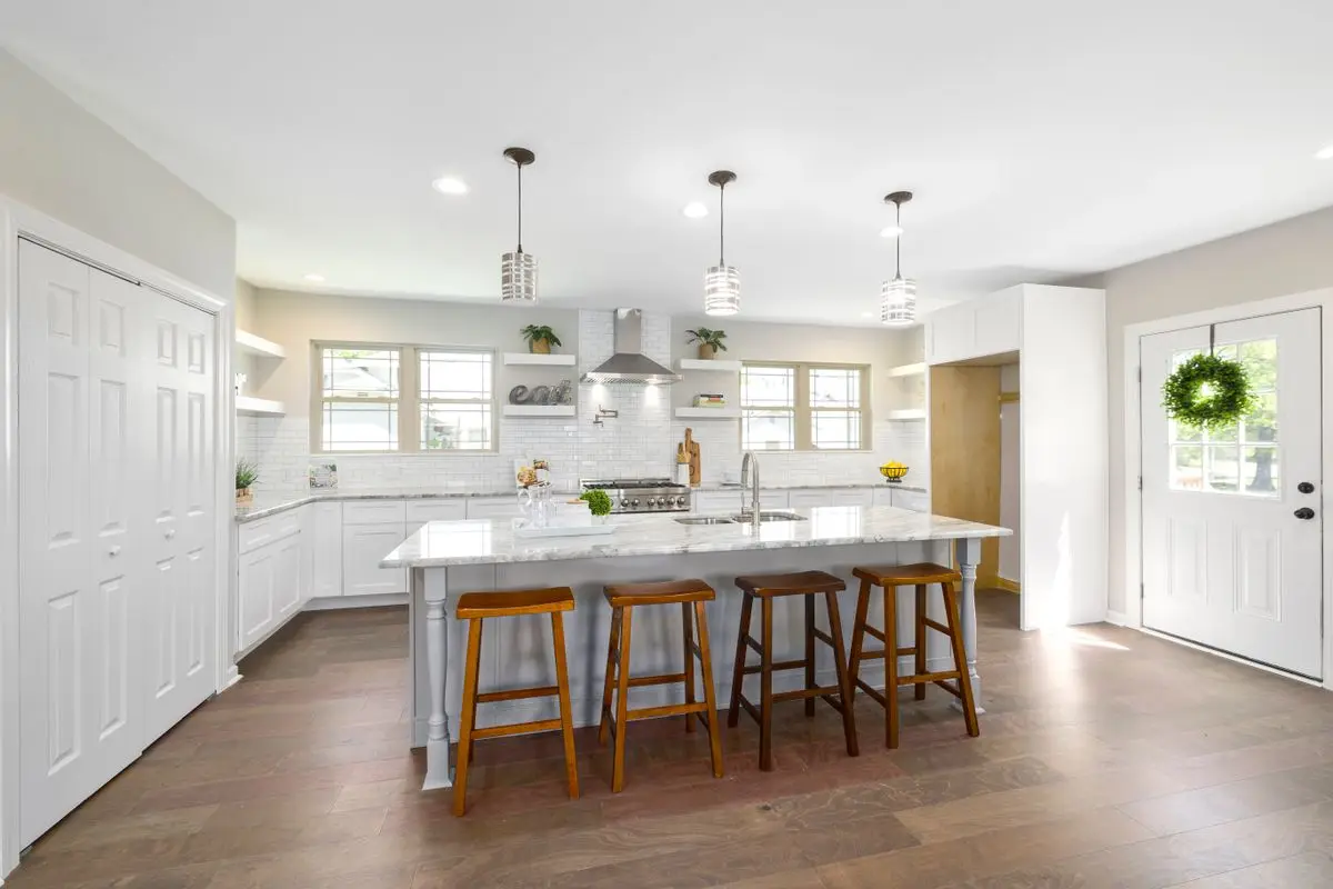 A bright residential kitchen with cabinets and counters. Wheaton.