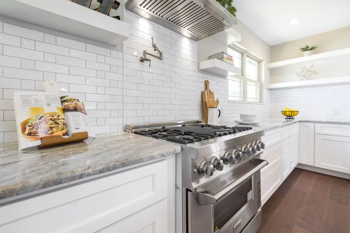 A bright residential kitchen with cabinets and counters. Wheaton.