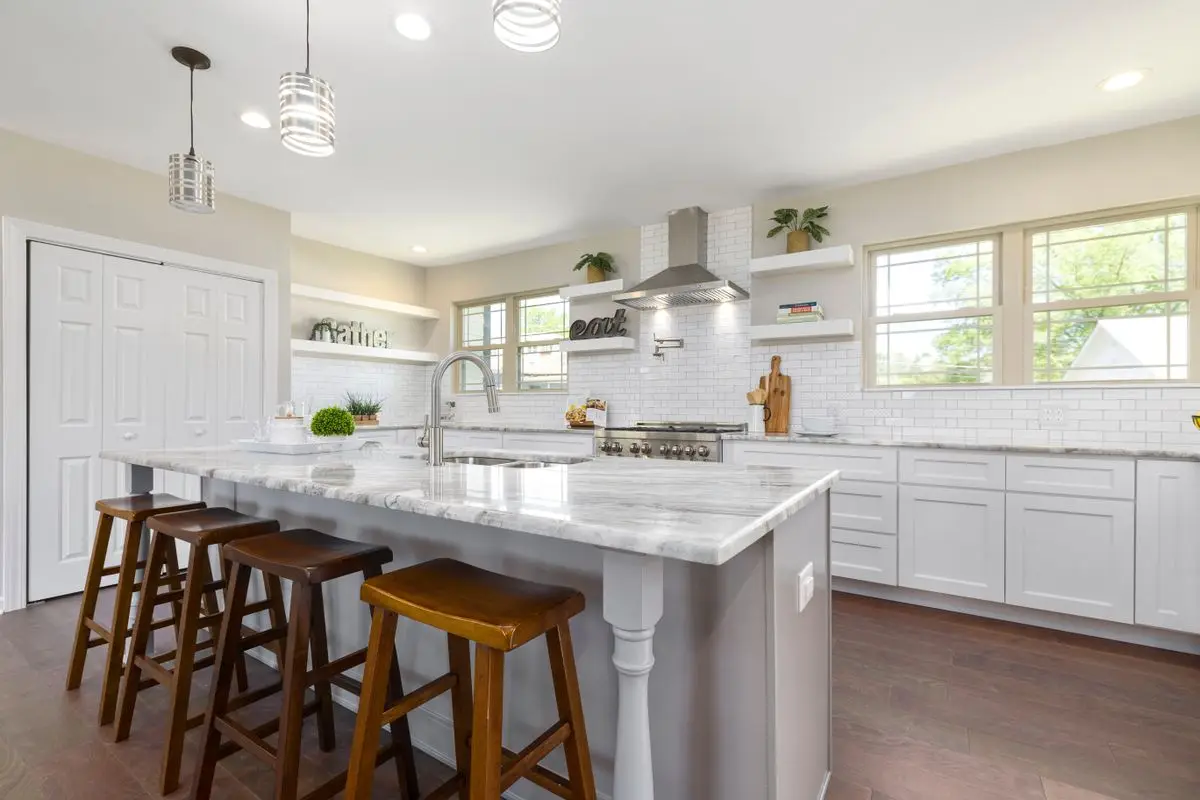 A bright residential kitchen with cabinets and counters. Wheaton.